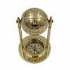 Brass compass with a globe