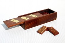 Wooden dominoes inlaid with brass