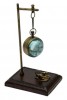 Hanging clock on a metal and leather base