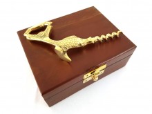 Metal opener in a wooden box - fish