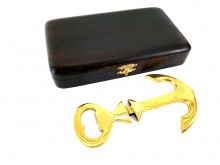 Metal opener in a wooden box - an anchor