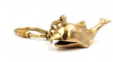 An exclusive dolphin key ring - brass