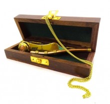 Brass and copper Bosun's whistle in a wooden box