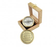 Brass compass in a wooden box