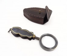 Travel magnifier in a leather case