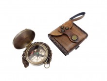 Magnetic compass in a leather case