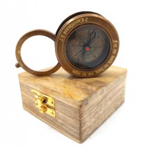 Brass compass with retractable magnifying glass ...