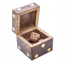 Small wooden dice in a box