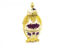 Faberge egg replica - purple and gold, with a ...