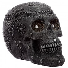 Decorative skull figurine with beads