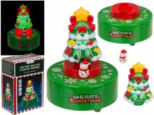 A Christmas tree music box with a dancing snowman ...