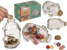 A glass jar in the shape of a pig