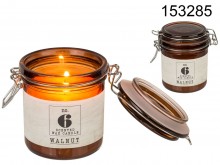 Scented candle in a jar with a walnut clip